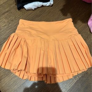 Gold Hinge orange mini skirt